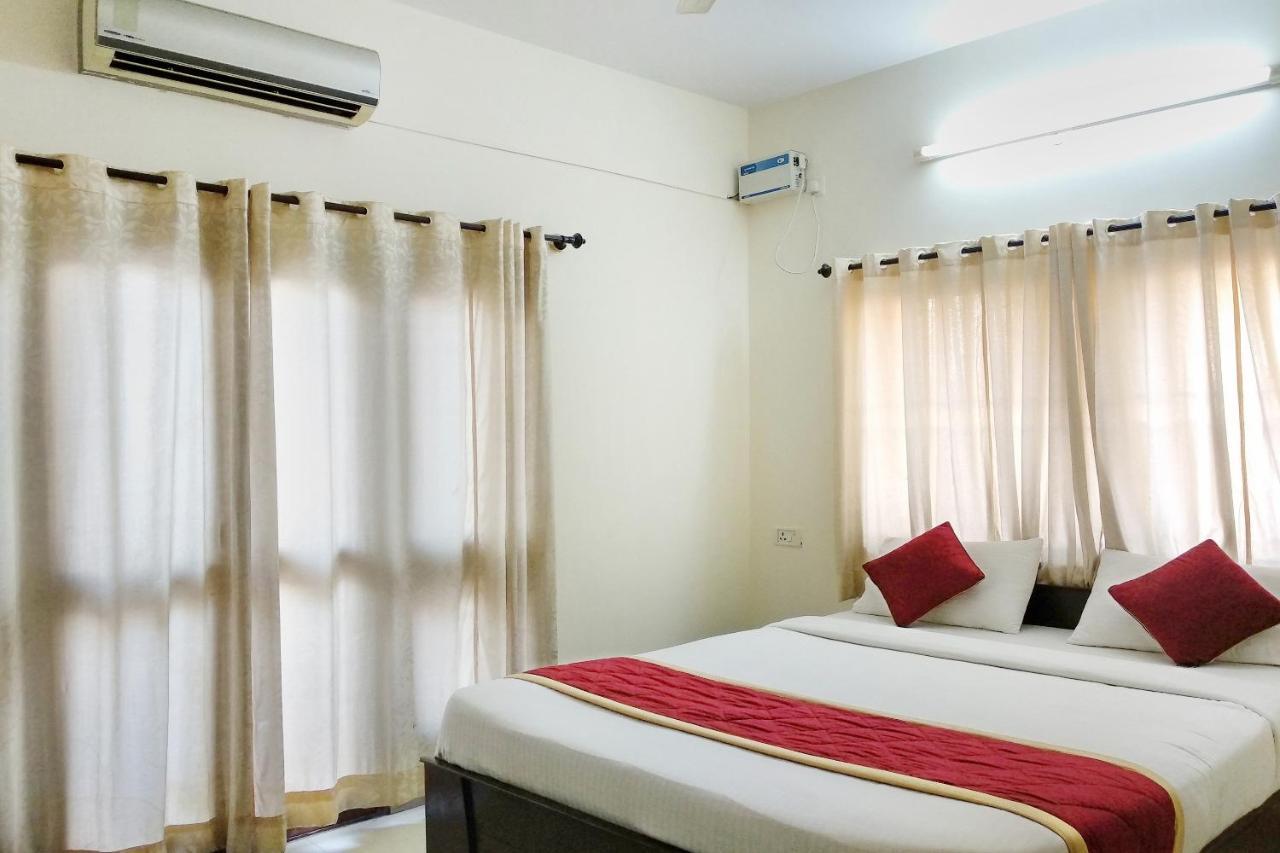 Super Oyo Capital O Premium Hotel Victoria Heights Near Sri Someshwara Swami Temple Bangalore Buitenkant foto